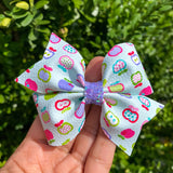 Colourful apple print bows!