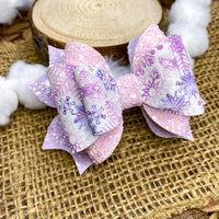 Gorgeous pink, purple and blue snowflake bows!
