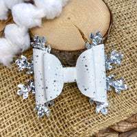 Gorgeous white speckled and silver glitter snowflake bows!