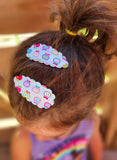 Adorable scalloped snap clips in cute prints perfect for back to school!