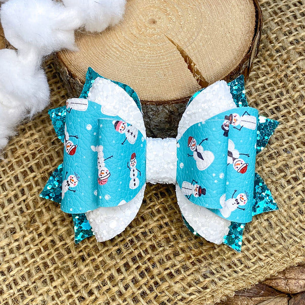 Adorable teal and white snow people print bows!