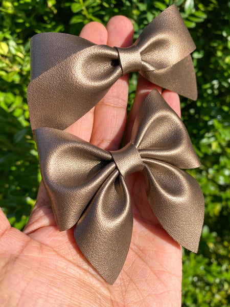 Beautiful smooth bronze faux leather bows