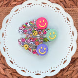 Cute emoji scalloped peek a boo snap clips with fun happy face embellishments!