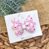 Adorable pink and white snow people print bows!