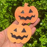 Adorable and super sparkly jack o' lantern snap clips, perfect for Halloween!