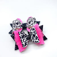 Black and white graffiti heart/XO print and bright pink glitter bows, perfect for Valentine's Day!