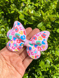 Bright and colourful leopard print bows!