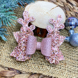Gorgeous super sparkly pink and rose gold reindeer bows, perfect for Christmas!