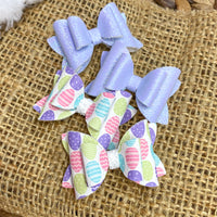 Sweet and colourful easter egg 2" stacked pigtail bows!