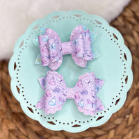 Beautiful pastel purple and aqua butterfly bows!