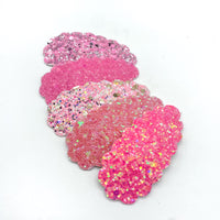 Super sparkly pretty in pink scalloped snap clips!