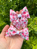 Sweet pink strawberry bows