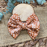 Gorgeous fawn print fabric bow clips or headbands.