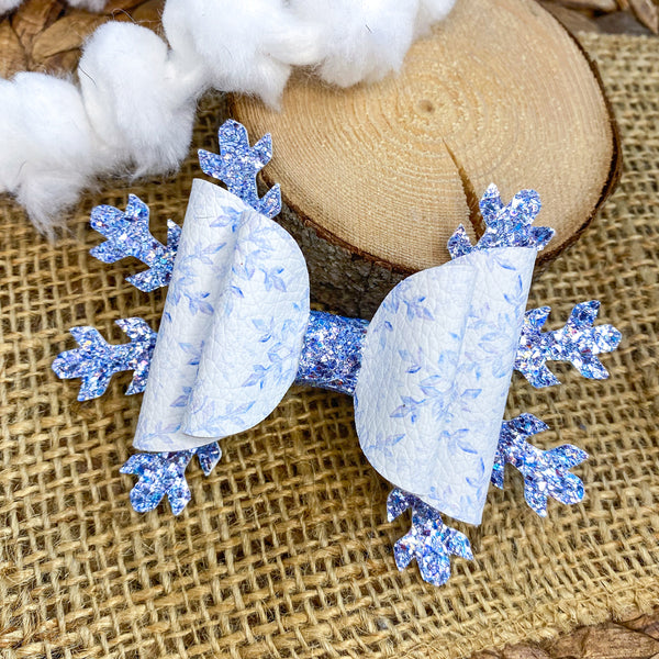 Beautiful snowflake print and foil glitter snowflake bow!
