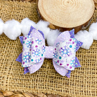 Beautiful teal and purple snowflake bows!