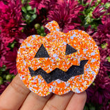 Adorable and super sparkly jack o' lantern snap clips, perfect for Halloween!