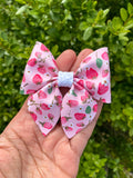 Sweet pink strawberry bows