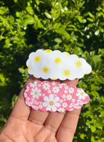 Fun bright sun or daisy print scalloped snap clips!