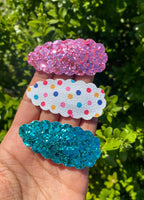 Fun bright leopard print or glitter scalloped snap clips!