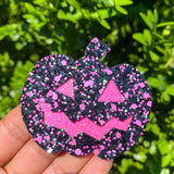 Adorable and super sparkly jack o' lantern snap clips, perfect for Halloween!