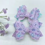 Beautiful pastel purple and aqua butterfly bows!