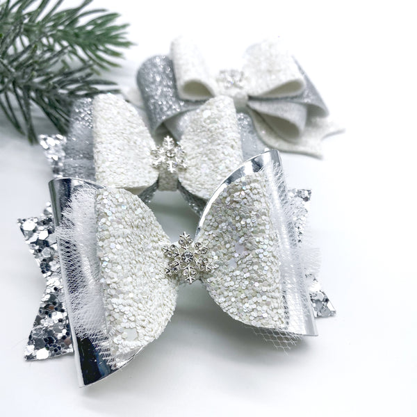 Beautiful silver and white glitter snowflake bows!
