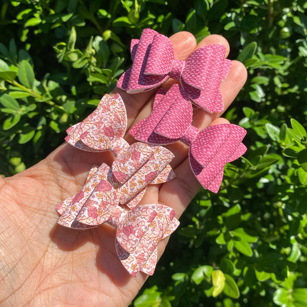 Beautiful muted faux leather 2" stacked pigtail bows!