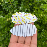 Adorable scalloped snap clips in cute prints perfect for back to school!