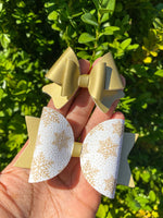 Gorgeous gold and white snowflake bows, perfect for winter or the holidays!