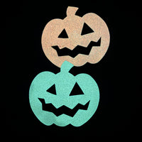 Adorable and super sparkly jack o' lantern snap clips, perfect for Halloween!