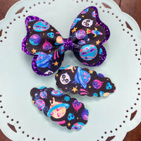 Adorable space themed butterfly bows and snap clips!