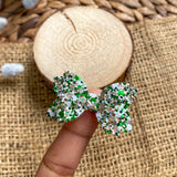 Super sparkly glitter pigtail bows perfect for St Patrick's Day!