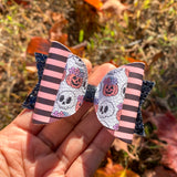 Adorable pumpkin and skull bows!