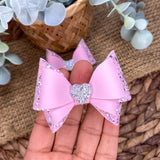 Beautiful sparkly pink Bella bows with heart detail, perfect for Valentine's Day!