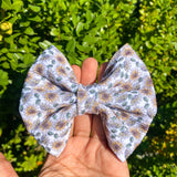 Gorgeous sunflower print fabric bow clips or headbands.