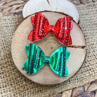 Super sparkly 2" stacked patent leather pigtail bows, perfect for the holidays!!