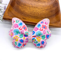 Bright and colourful leopard print bows!