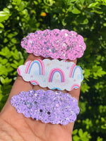 Adorable scalloped snap clips in cute prints and glitters!