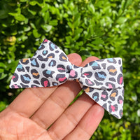 Fun and funky Leopard print bows and Dinos!