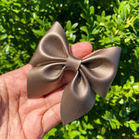 Beautiful smooth bronze faux leather bows