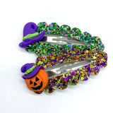 Super sparkly or spooky scalloped peek a boo snap clips with fun Halloween embellishments!
