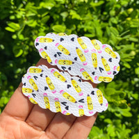 Adorable scalloped snap clips in cute prints perfect for back to school!