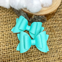 Gorgeous chunky and fine glitter 2" stacked pigtail bows!