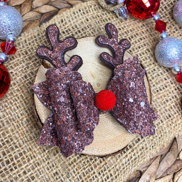 Adorable shimmer sparkle glitter and suede reindeer bows, perfect for Christmas!