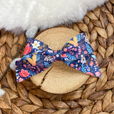 Beautiful deep blue and pink floral bows!