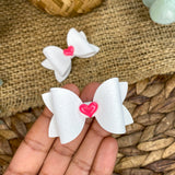 Adorable pastel pigtail bows with heart embellishments!