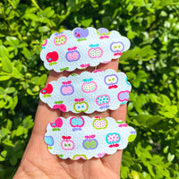 Adorable scalloped snap clips in cute prints perfect for back to school!