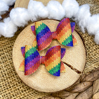 Adorable faux knit rainbow 2" pigtail bows!