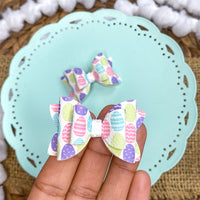 Sweet and colourful easter egg 2" stacked pigtail bows!