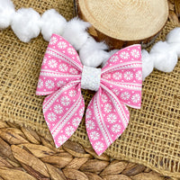 Pretty pink and white snowflake sweater print bows!